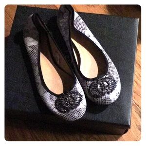 Leather snakeskin ballet flats.